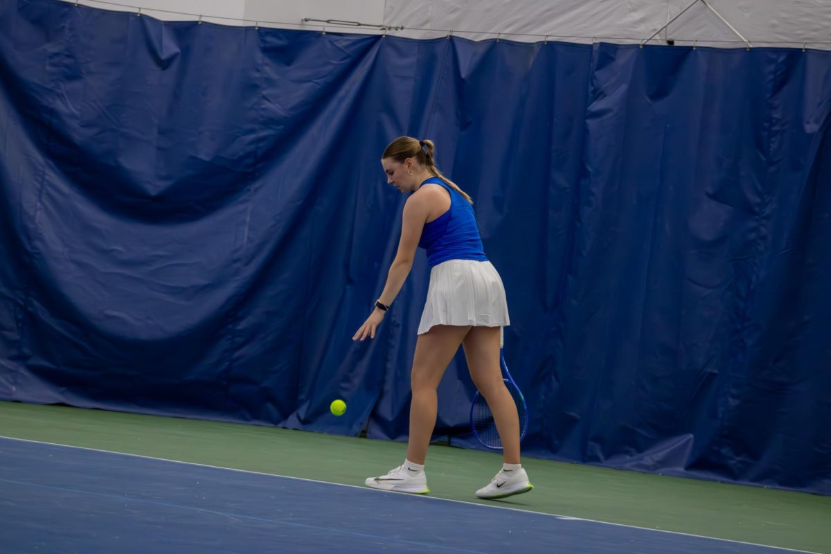 Zora Koenig gets set to serve on court four against Northwestern University at the Adams Tennis Complex on Jan. 31, 2026. 