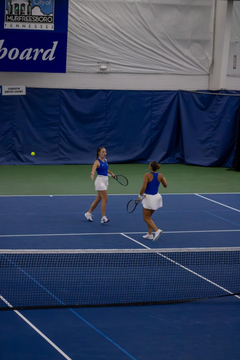 Lena Peyer and Sara Conde celebrate winning a point during their doubles match against Northwestern University at the Adams Tennis Complex on Jan. 31, 2026. 