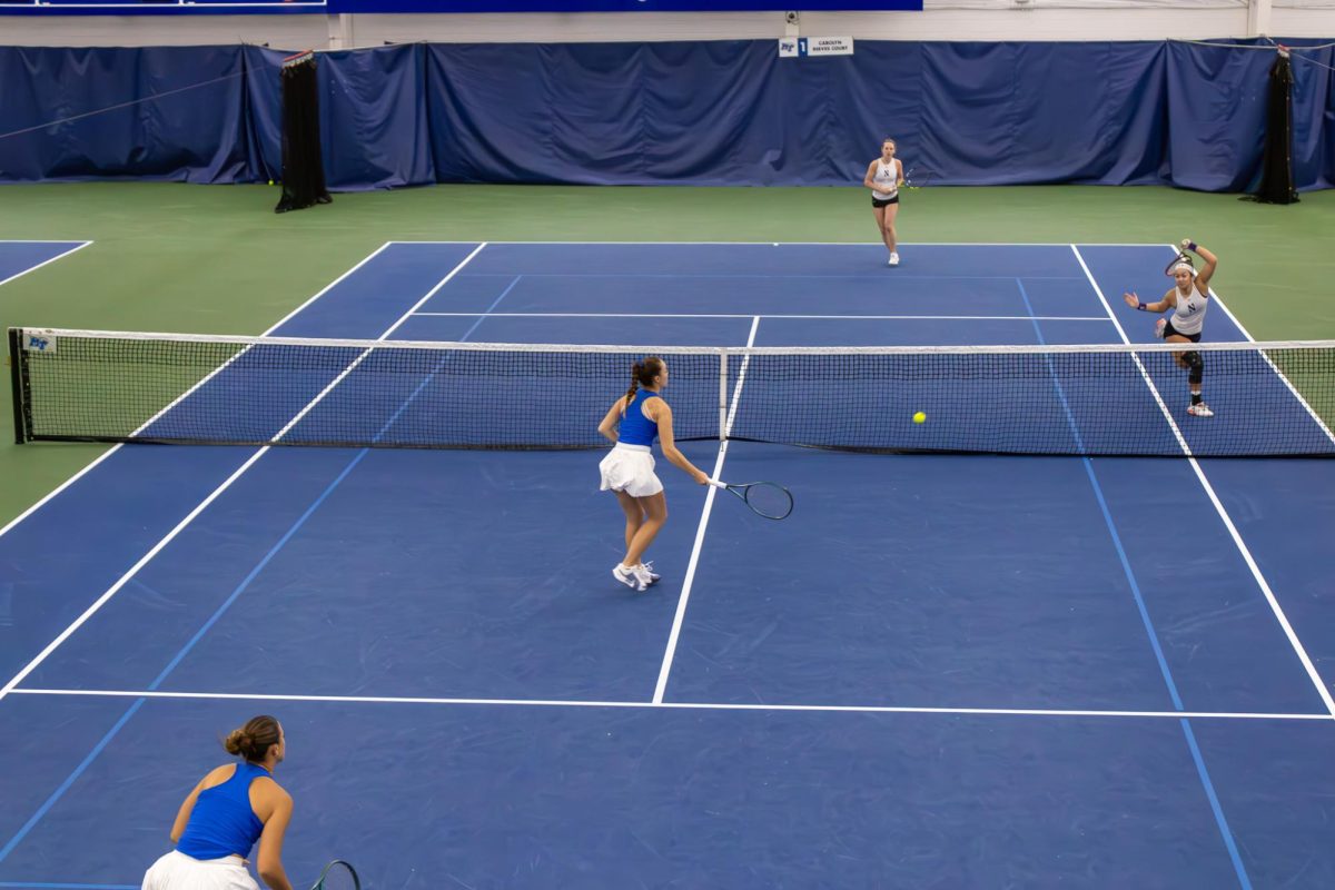 Lena Peyer and Sara Conde look to return a shot against Northwestern University at the Adams Tennis Complex on Jan. 31, 2026. 