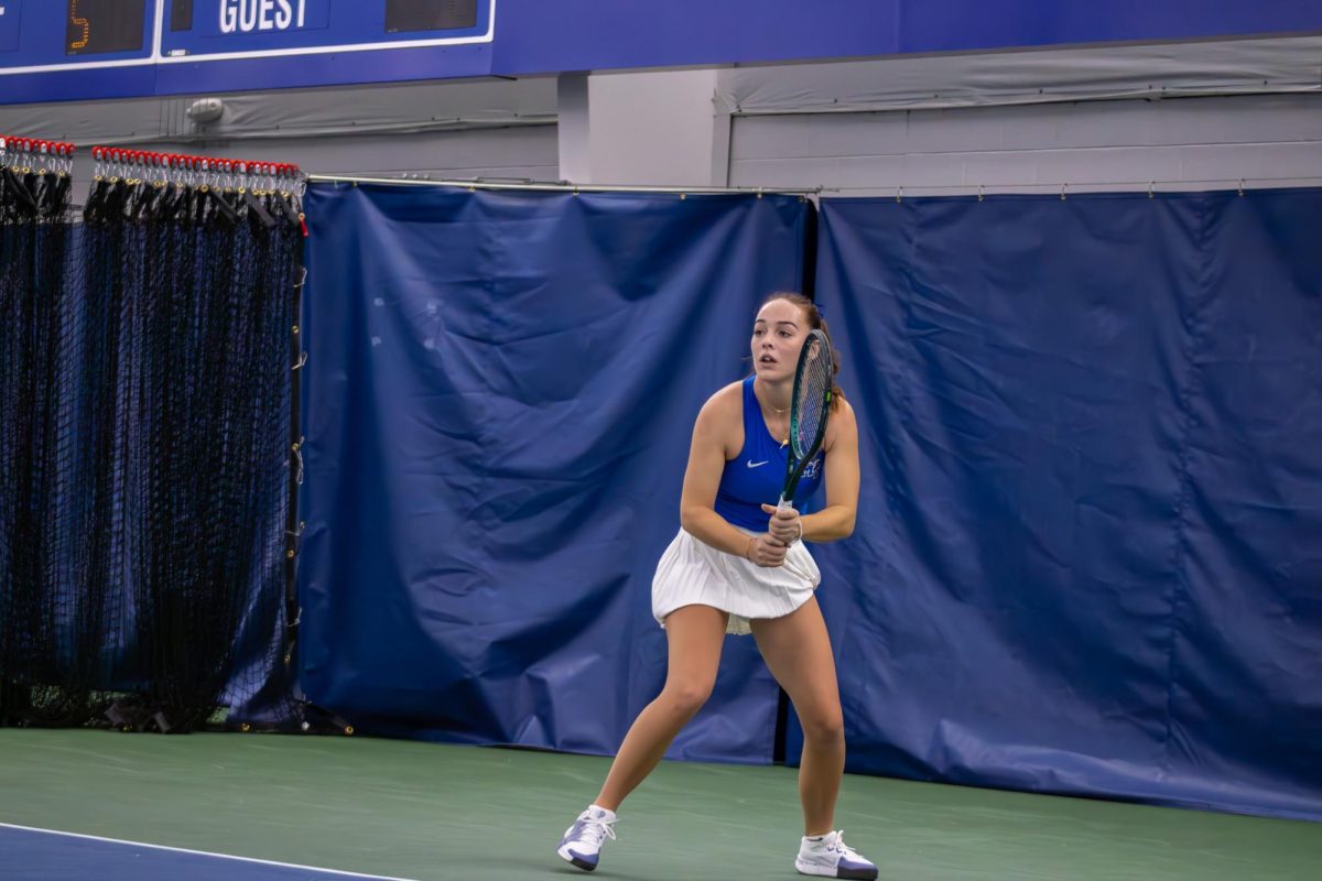 Lena Peyer sets for a back hand return against Northwestern University at the Adams Tennis Complex on Jan. 31, 2026. 
