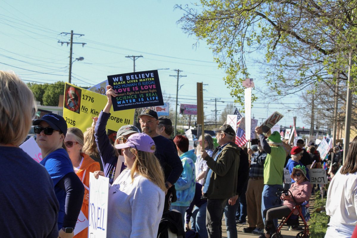 Protesters gather along Broad Street at the "No Kings" protest in Murfreesboro, Tennessee, on March 28, 2026.