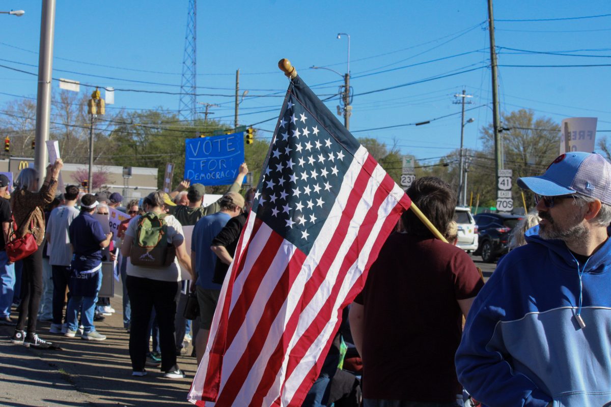 Protesters gather along Broad Street at the "No Kings" protest in Murfreesboro, Tennessee, on March 28, 2026.