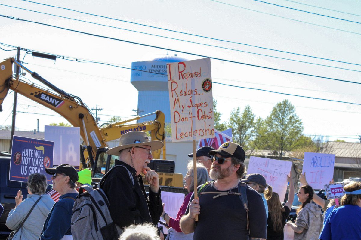 Protesters gather along Broad Street at the "No Kings" protest in Murfreesboro, Tennessee, on March 28, 2026.
