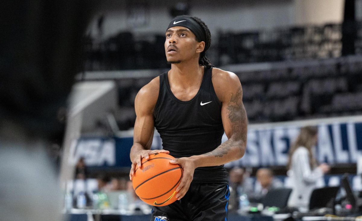 Marcus Whitlock Jr. in warmups for the Blue Raiders' quarterfinal game against Louisiana Tech in the CUSA tournament at the Propst Arena in Huntsville, Alabama. 