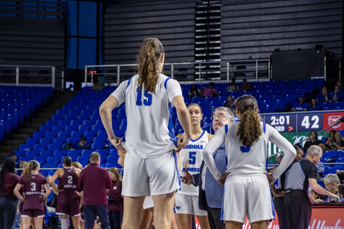 MTSU head coach Rick Insell talks to the team during a time out in a game against Missouri State in the Murphy Center on March 7, 2026.