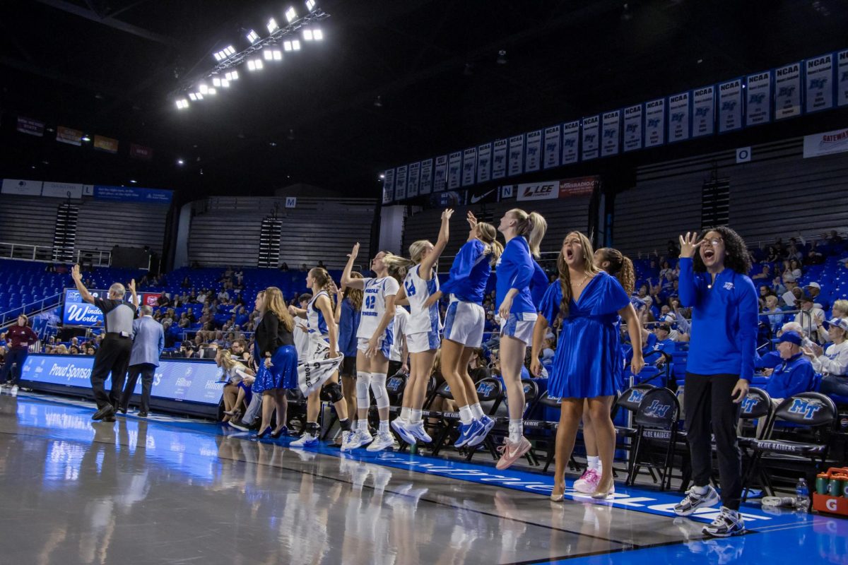 The MTSU bench celebrating after a play in a game against Missouri State in the Murphy Center on March 7, 2026.