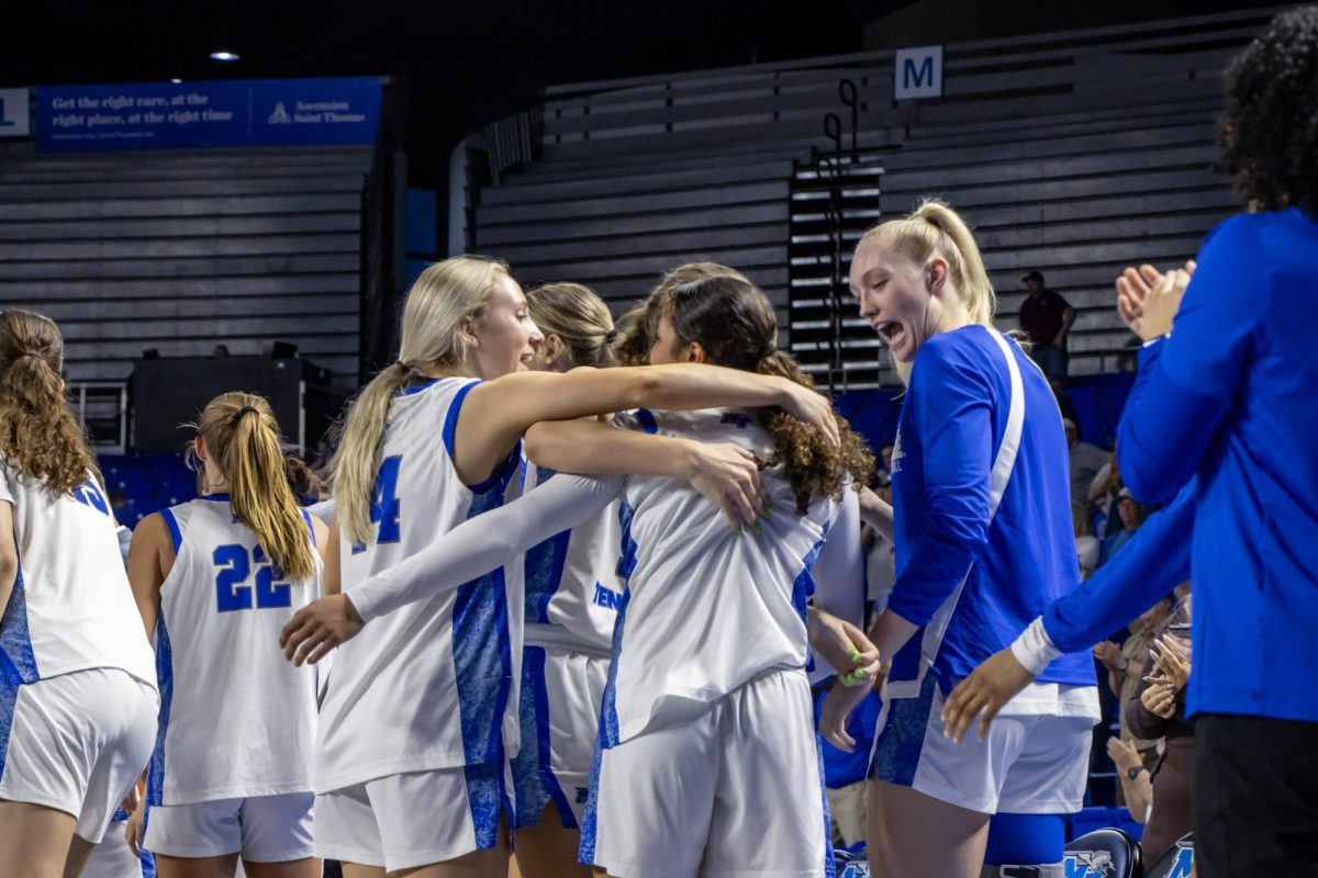 The MTSU team embraces Alayna Contreras after winning her senior night game against Missouri State in the Murphy Center on March 7, 2026.