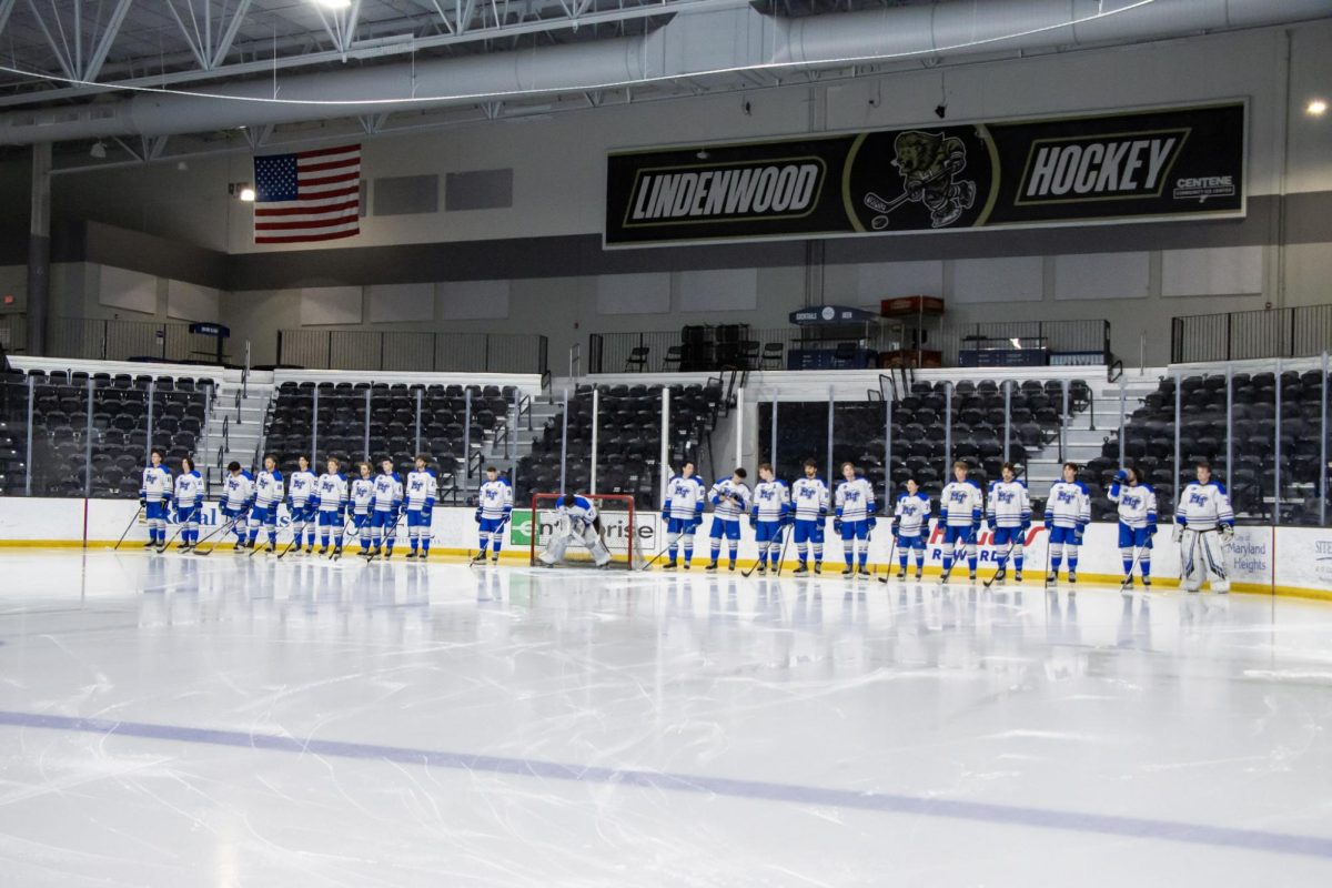 The MTSU club hockey team stands on the ice during the starting lineup announcement before a game against Grand Valley State at the Centene Community Ice Center on March 20, 2026.