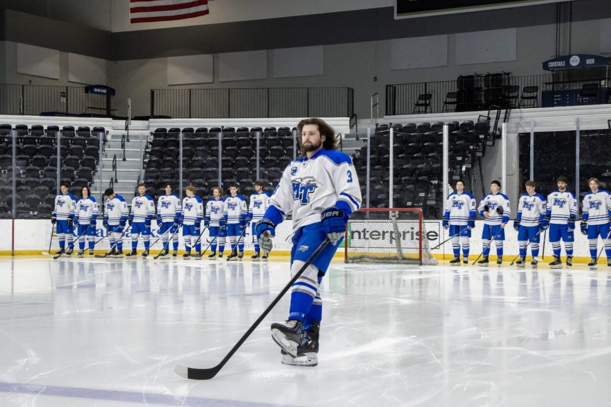 MTSU club hockey defenseman Justin Beachler skates to the blue line during the starting line up announcements before a game against Grand Valley State at the Centene Community Ice Center on March 20, 2026.