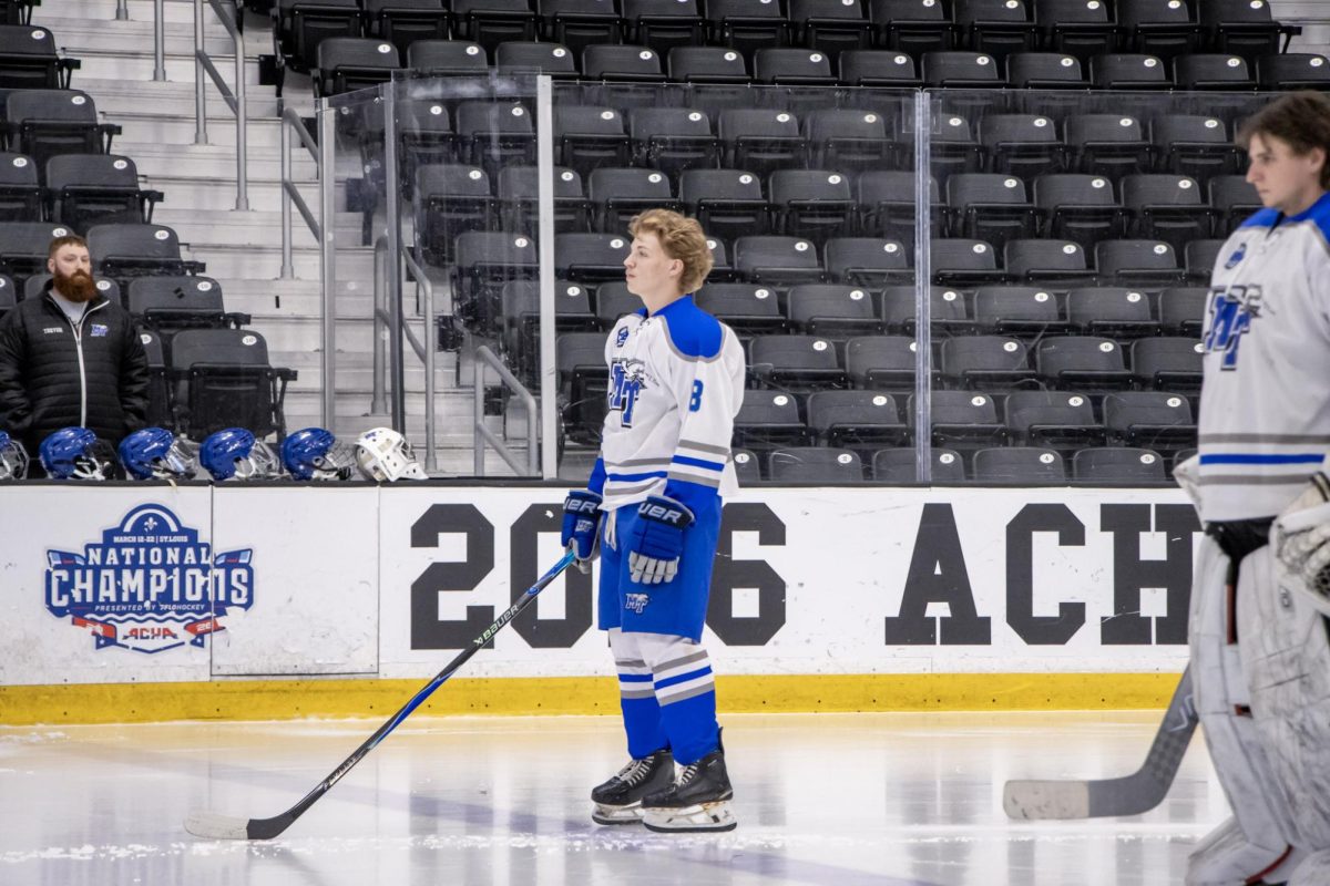 MTSU club hockey defenseman Aydin Suss stands at the blue line during starting line up announcements before a game against Grand Valley State at the Centene Community Ice Center on March 20, 2026.