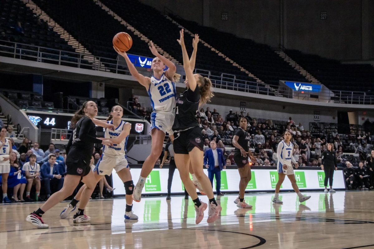 MTSU guard Macie Phifer plays through contact during the Conference USA quarterfinal game against Missouri State inside Propst Arena on March 12, 2026.