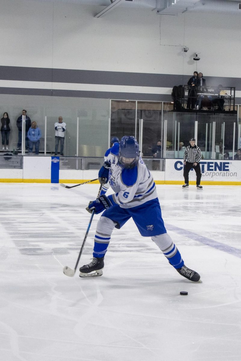 MTSU club hockey defenseman Jacob Schenk receiving the puck during a game against Northwood at the Centene Community Ice Center on March 19, 2026.