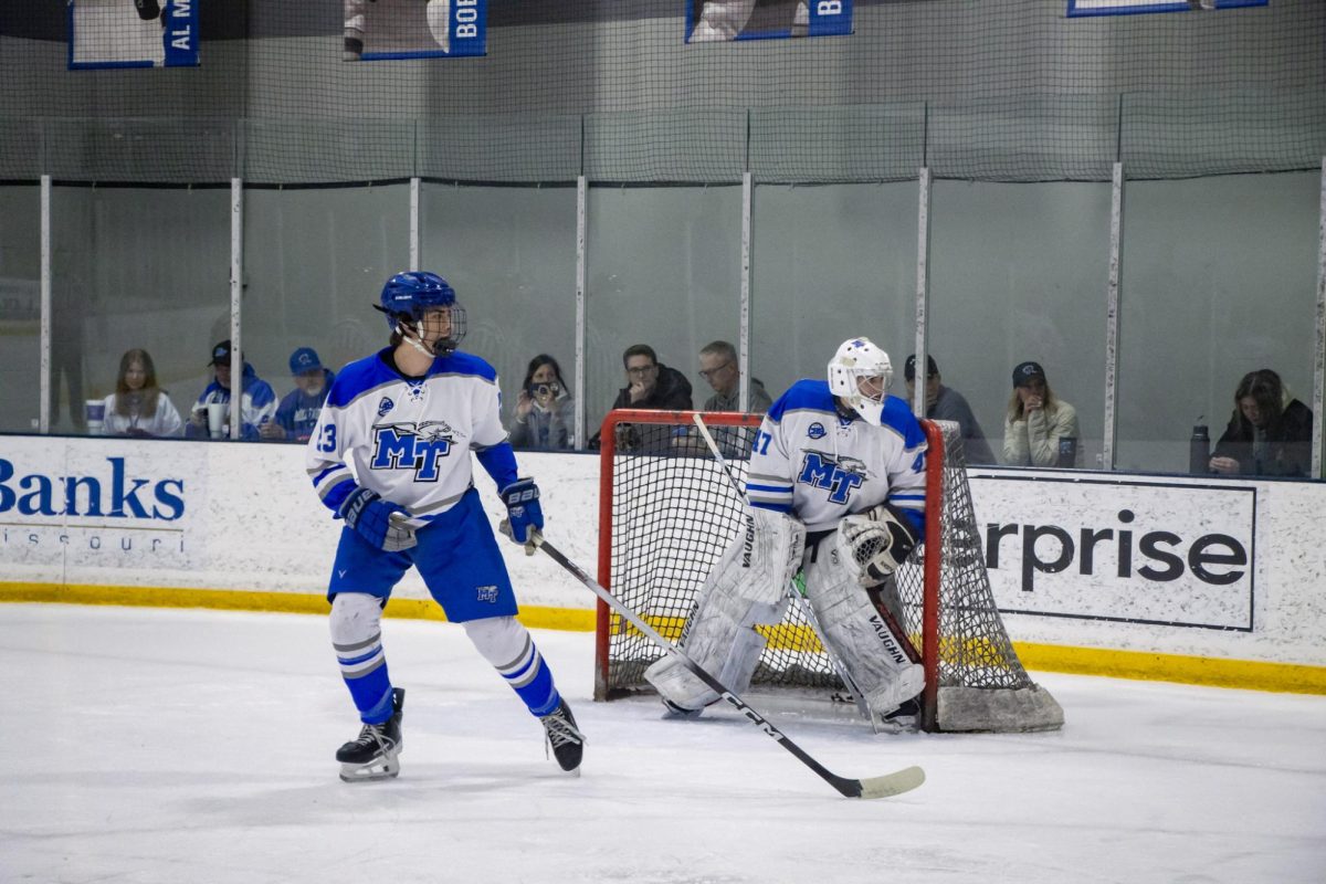 MTSU goaltender Ayden Kopec watches the puck in the corner during a game against Northwood at the Centene Community Ice Center on March 19, 2026.