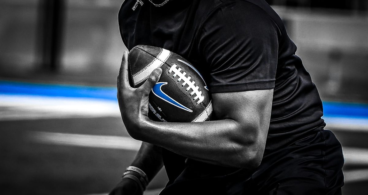 A MTSU player holds a football during NFL Pro Day at Floyd Stadium on March 30, 2026.