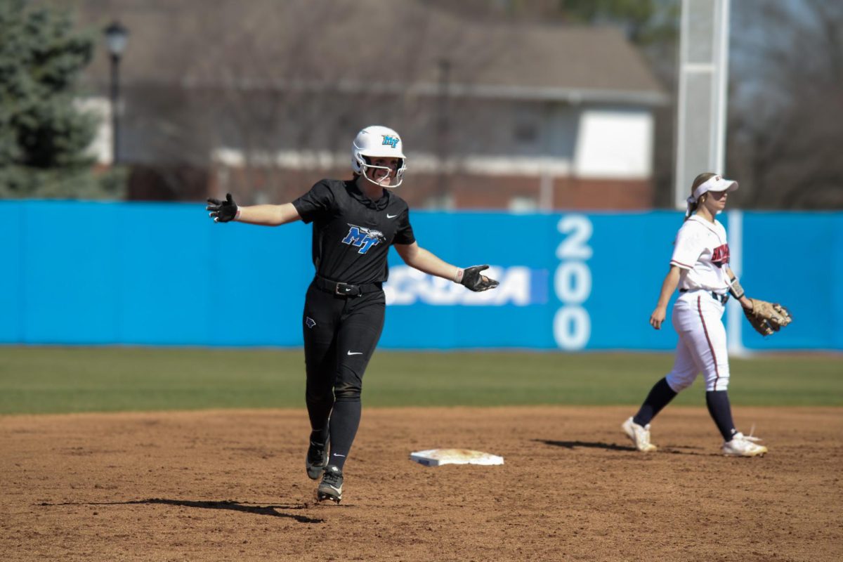 Lucie McDonald (17) hits MTSU’s first home run against UT Martin at Blue Raider Softball Field on Feb. 28, 2026.