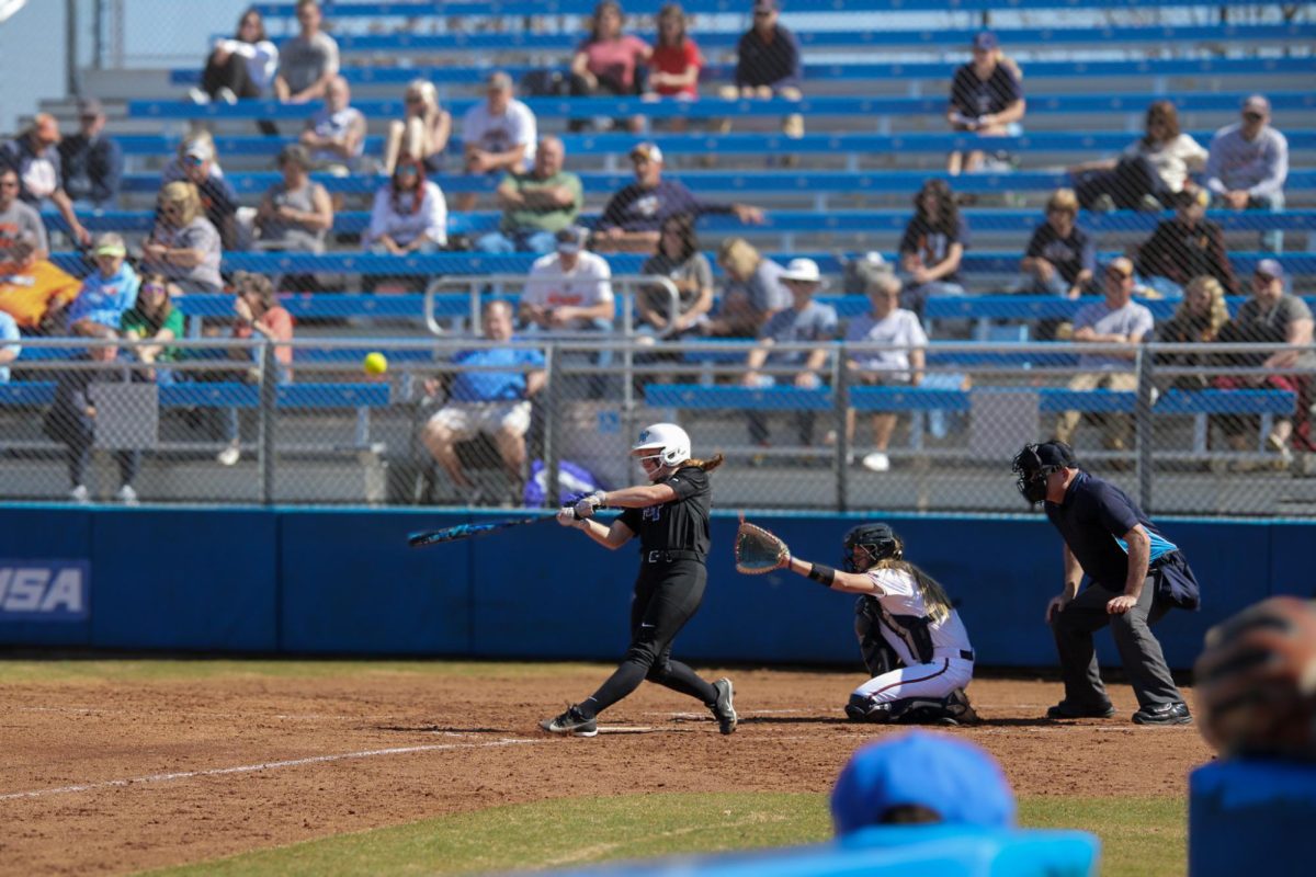 Lucie McDonald (17) hits MTSU’s first home run against UT Martin at Blue Raider Softball Field on Feb. 28, 2026.