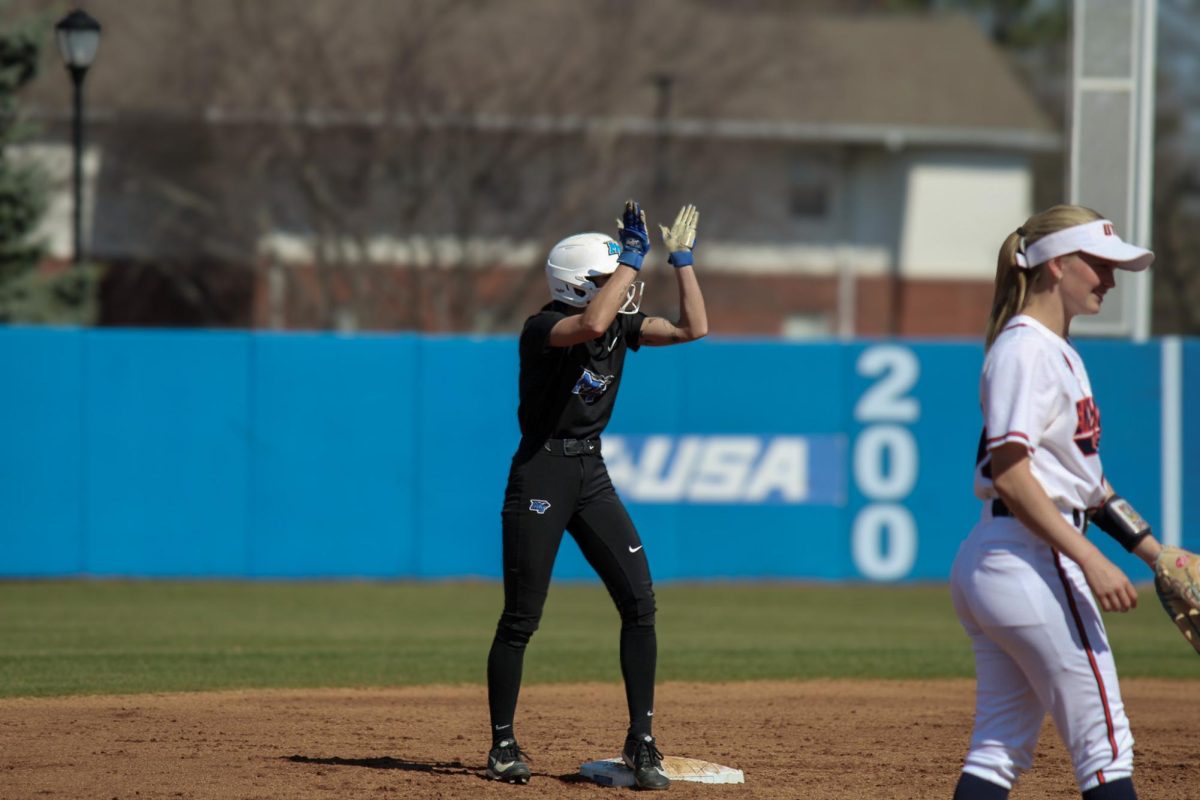 Macy Harter (5) cheers on Jana Want (16) after she draws a walk against UT Martin at Blue Raider Softball Field on Feb. 28, 2026.