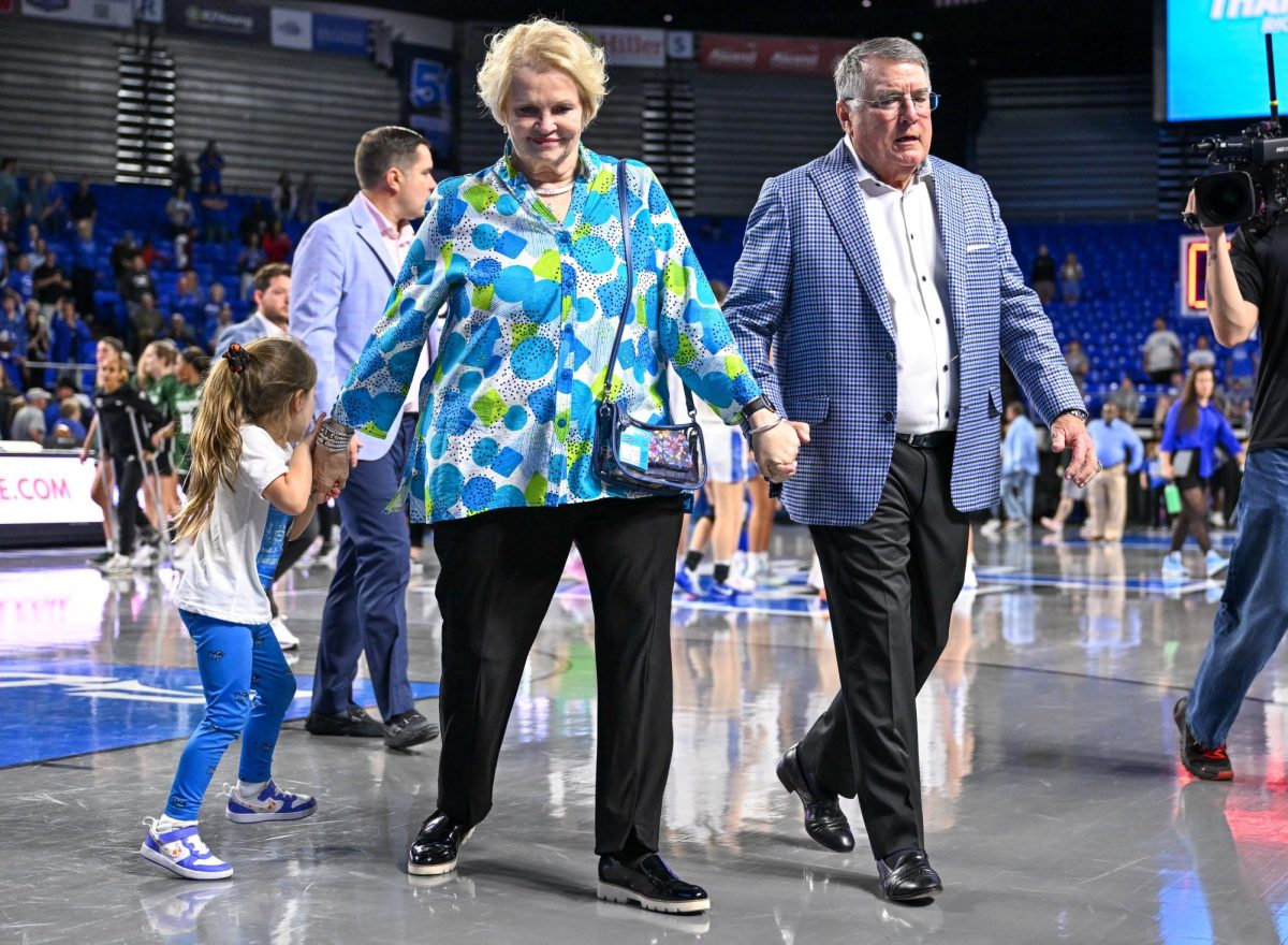 MTSU head coach Rick Insell (right) walks off the court for the final time with his wife Deb Insell (left) after a 66-56 loss in the Super 16 WNIT tournament game against Cleveland State University on March 26, 2026.