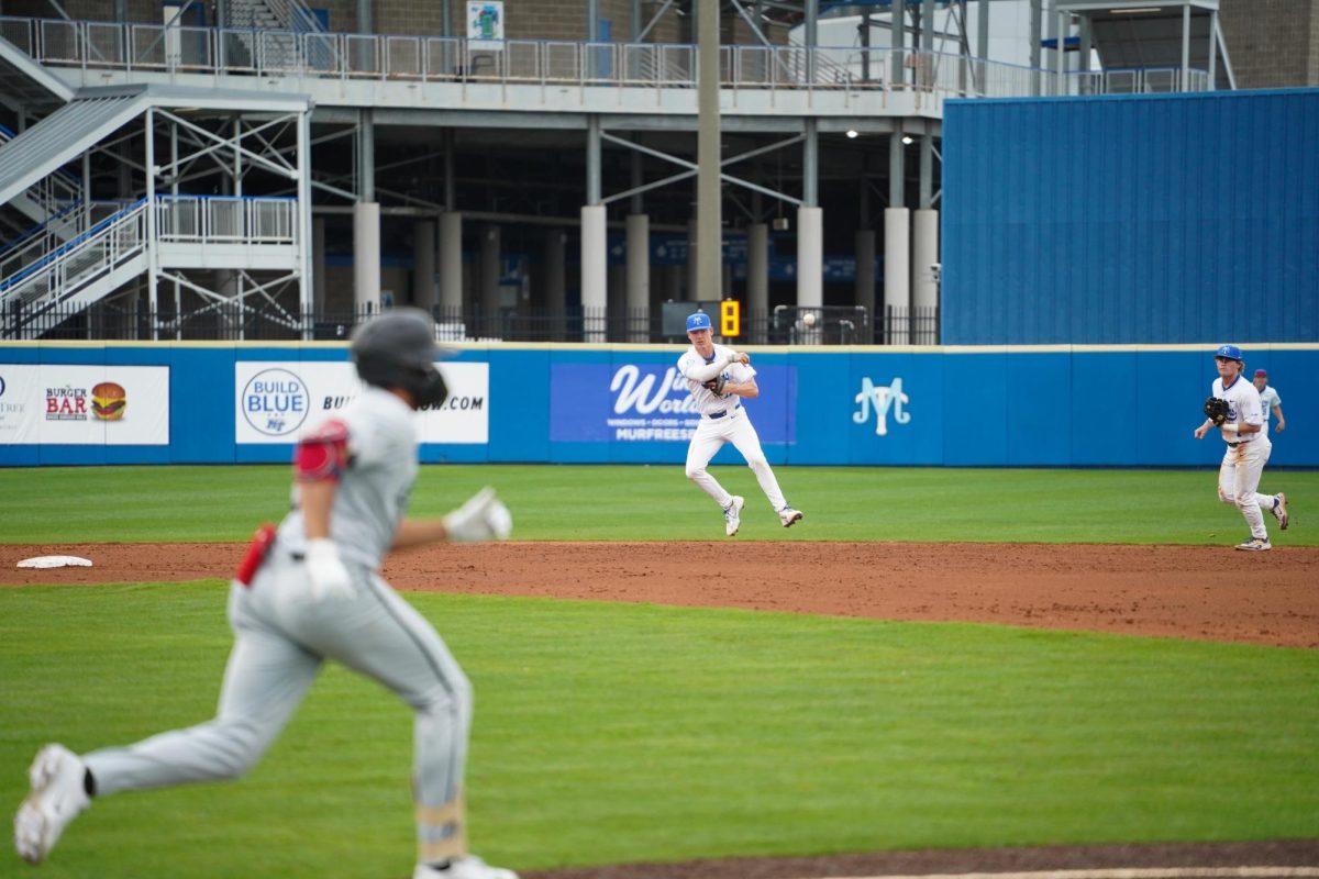 MTSU infielder Clay Badylak jumps and throws the ball to first base to record the out against Eastern Kentucky University at Reese Smith Jr. Field on March 10, 2026.