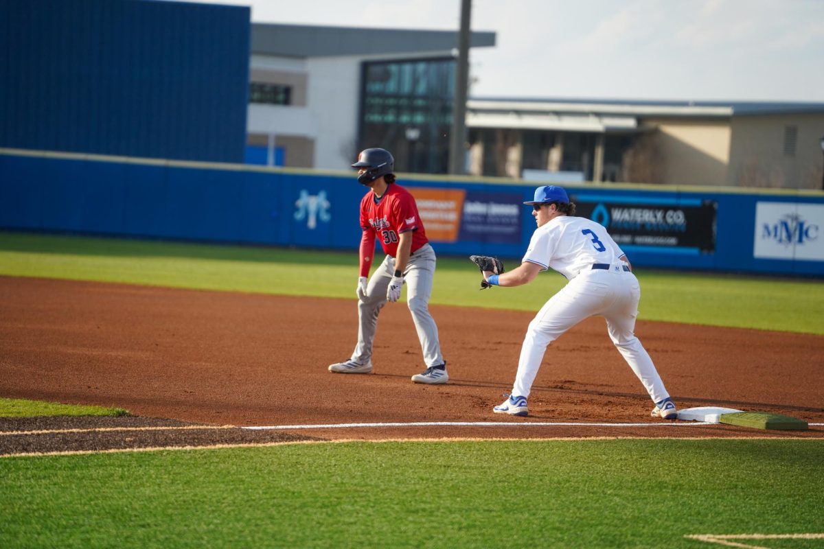 Middle Tennessee infielder Tyler Minnick holds a runner on first base during a game against the Belmont Bruins at Reese Smith Jr. Field on March 4, 2026.