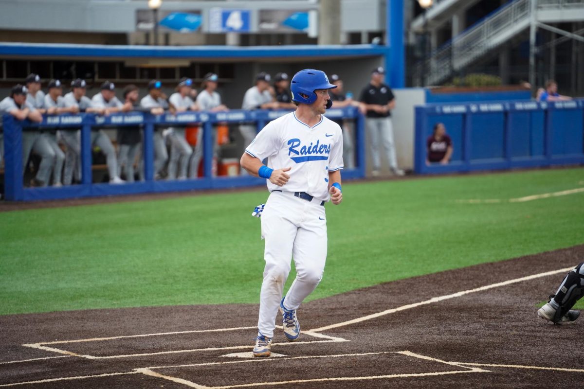MTSU infielder Tyler Minnick touches home and scores against Eastern Kentucky University at Reese Smith Jr. Field on March 10, 2026.
