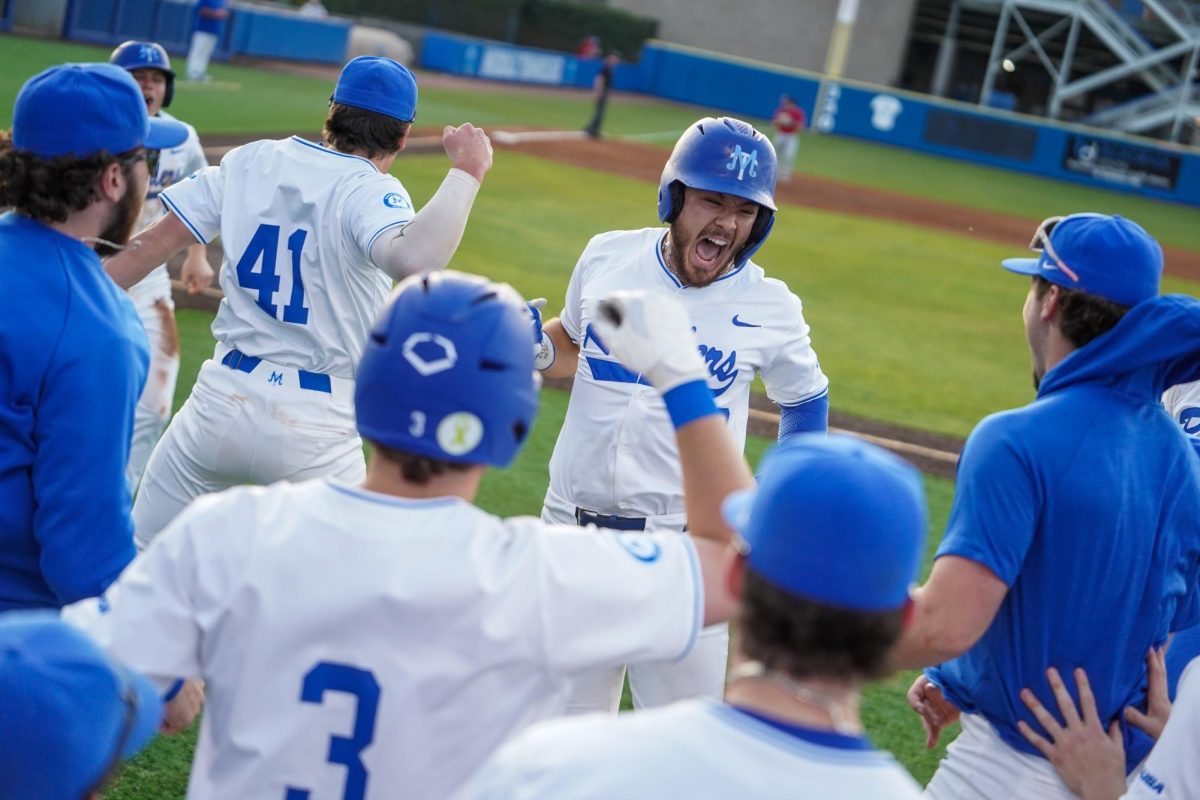 Middle Tennessee catcher Dean O'Neill celebrates with teammates after hitting his second home run of the day during a game against the Belmont Bruins at Reese Smith Jr. Field on March 4, 2026.