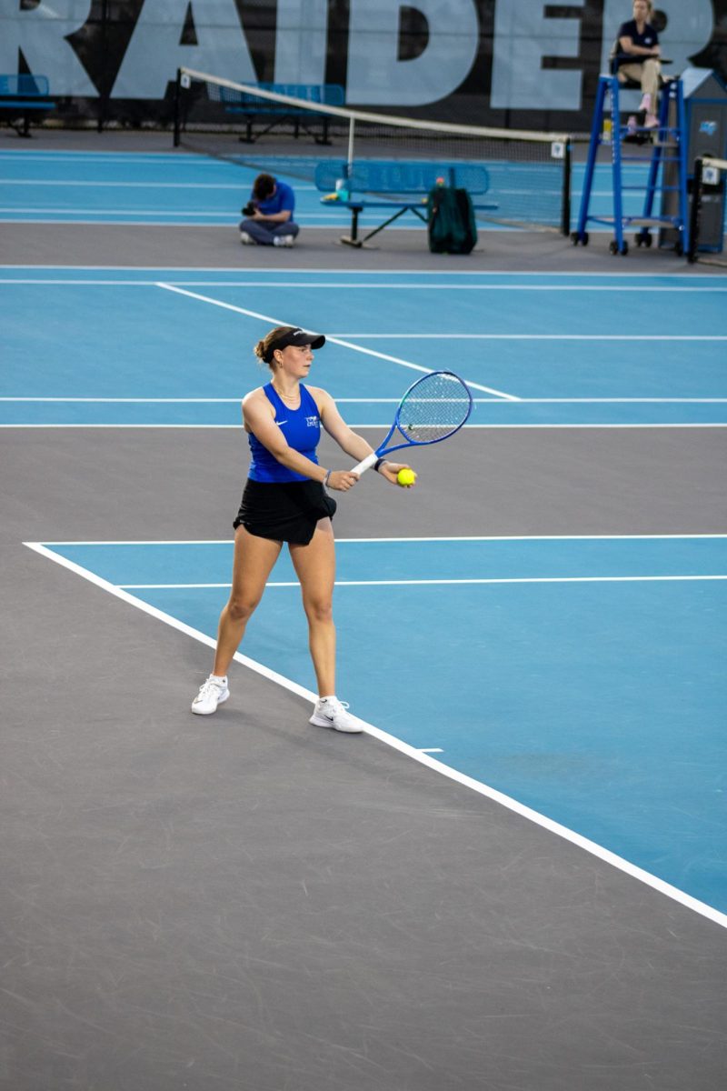 Zora Koenig begins to serve at the MTSU Tennis Complex on Feb. 28, 2026.