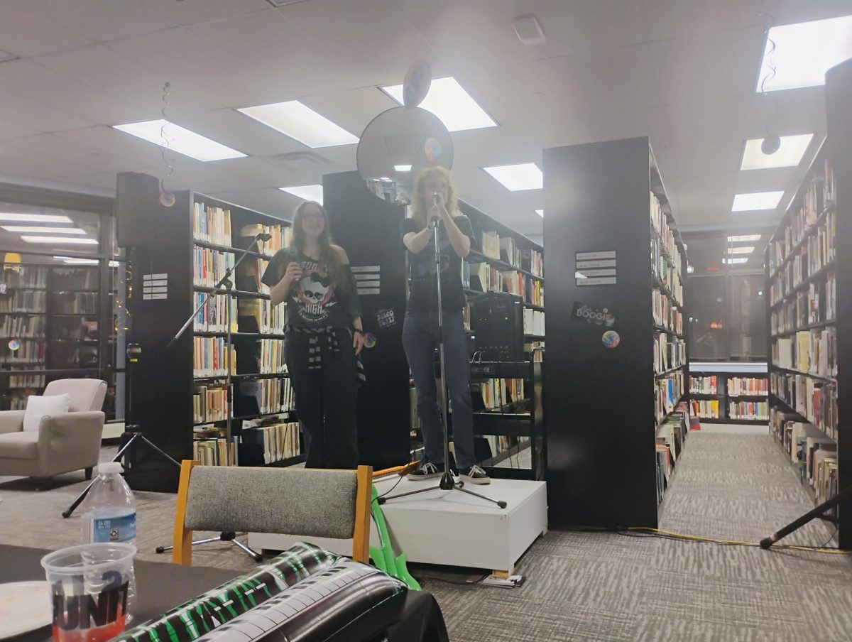 Avery Young and Lincoln Tune singing "Creep" by Radiohead on Karaoke Night in the Center for Popular Music on March 31, 2026.