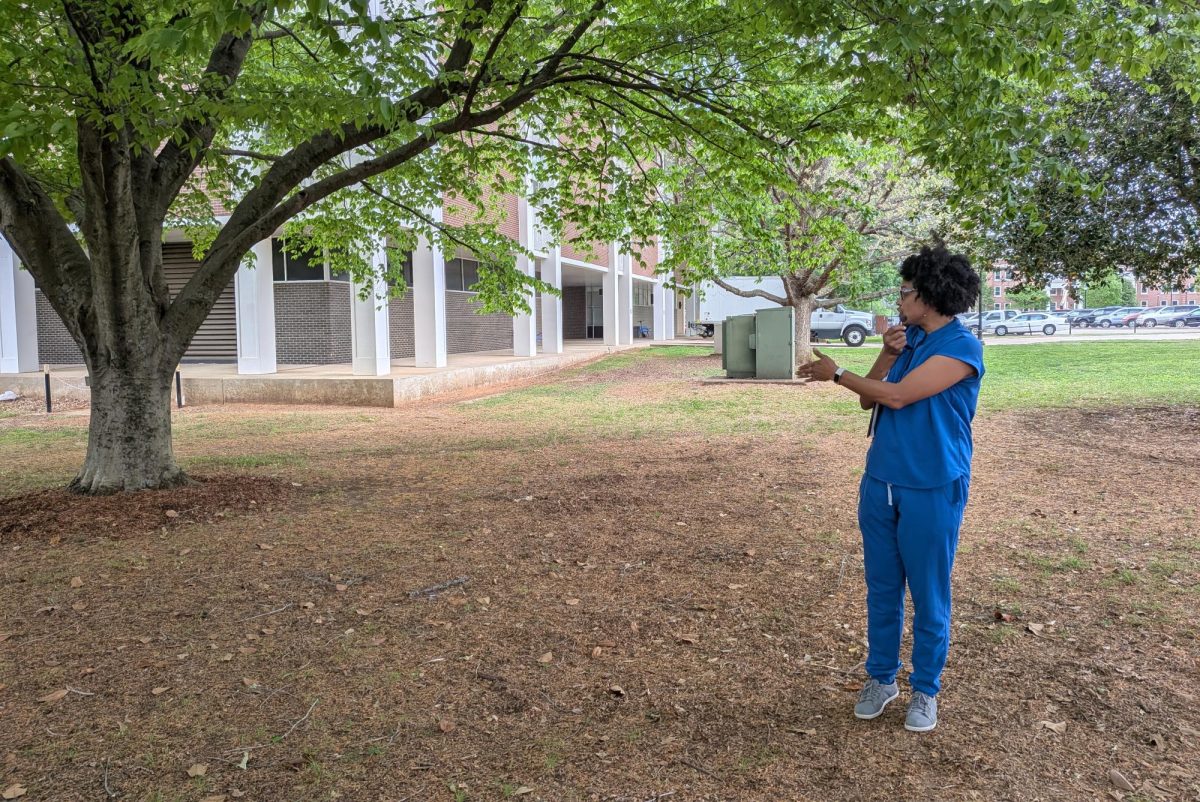 Danielle Brown of the Department of Biology at MTSU speaks during the guided Arboretum tour outside Peck Hall on April 17, 2026. 