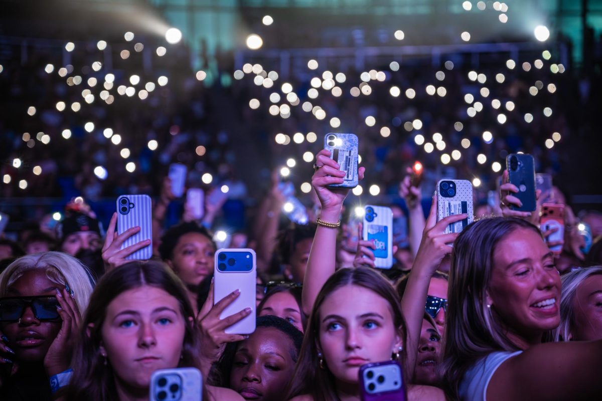 Fans both in the pit and in the stands light up the stage during the MTSU spring 2026 Signature Event concert inside the Murphy Center on Apr. 29, 2026. 