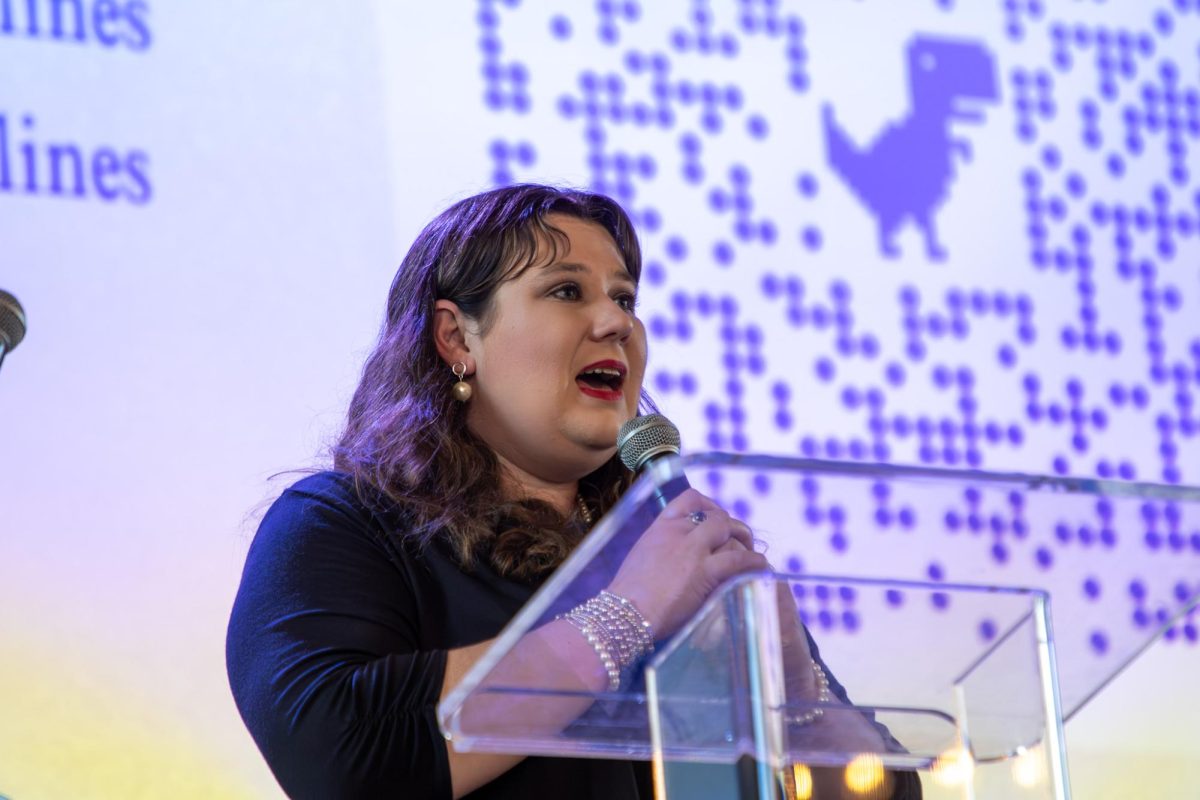 MTSU Sidelines adviser Emily West speaks to the crowd during the MTSU Sidelines 100 Years Celebration at Riverside Revival in Nashville, Tennessee, on April 9, 2026. 
