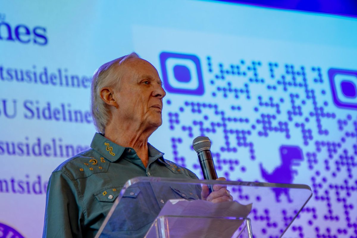 Former MTSU Sidelines adviser Leon Alligood speaks before a crowd of Sidelines Alumni during the MTSU Sidelines 100 Years Celebration at Riverside Revival in Nashville, Tennessee, on April 9, 2026. 