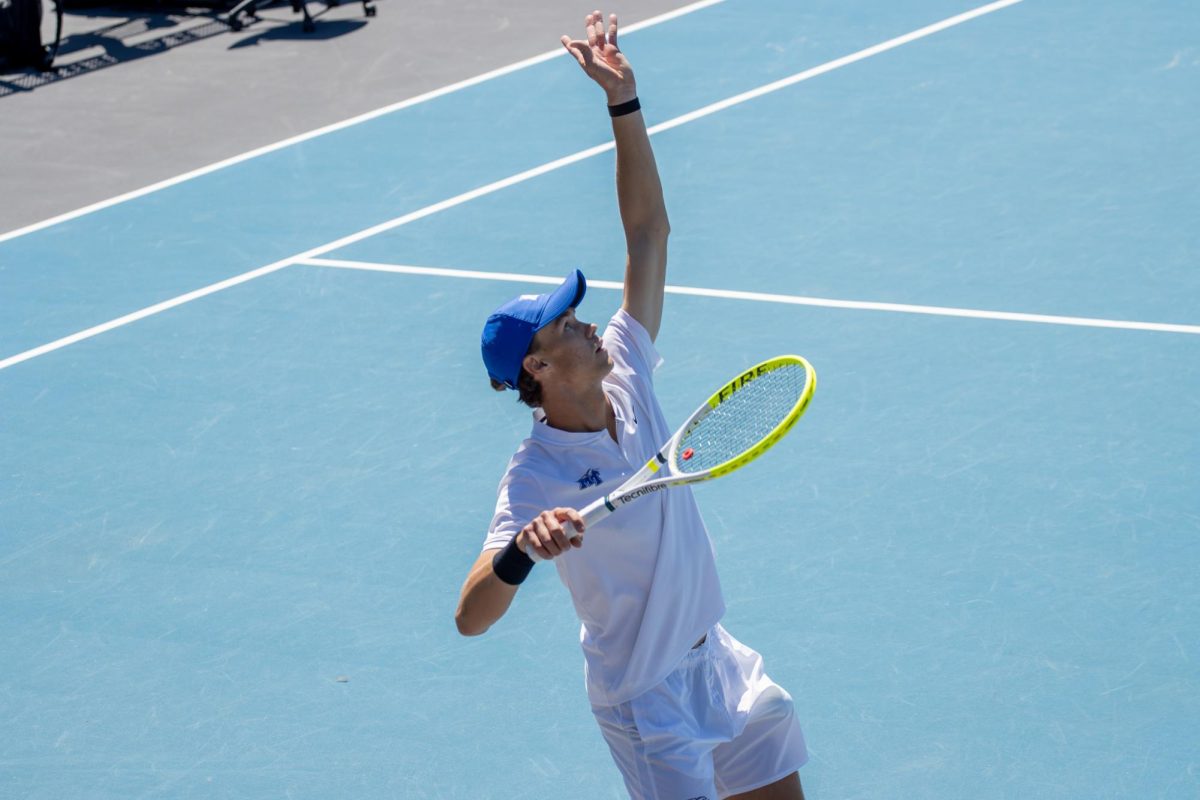 Jonasz Dziopak starts his serve during the CUSA men's tennis championships against Liberty University at the Outdoor Tennis Complex on April 19, 2026. 