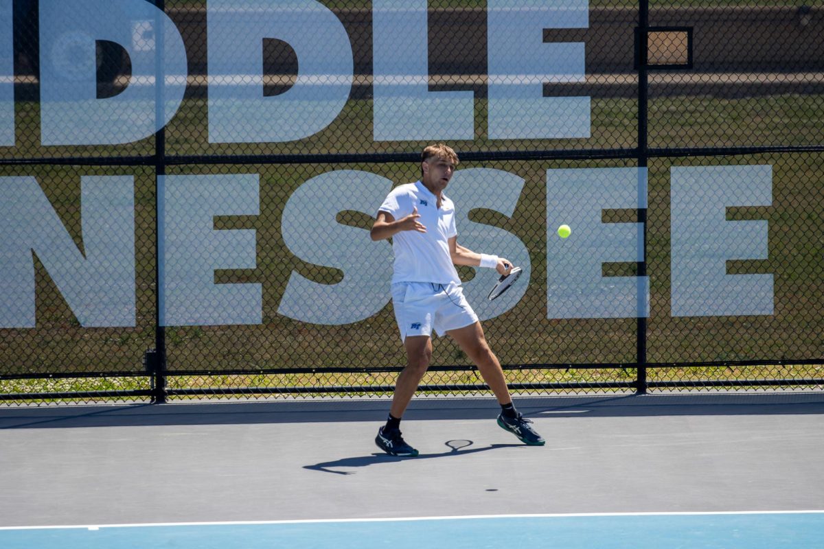 Eric Crevei sets up for a forehand short during singles of the CUSA men's tennis championship against Liberty University at the Outdoor Tennis Complex on April 19, 2026. 
