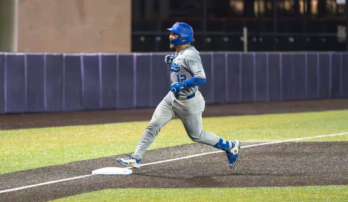 MTSU catcher Dean O'Neill celebrates while rounding the bases after a 13th inning home run during a game against Belmont University at E.S Rose Park on April 14, 2026.
