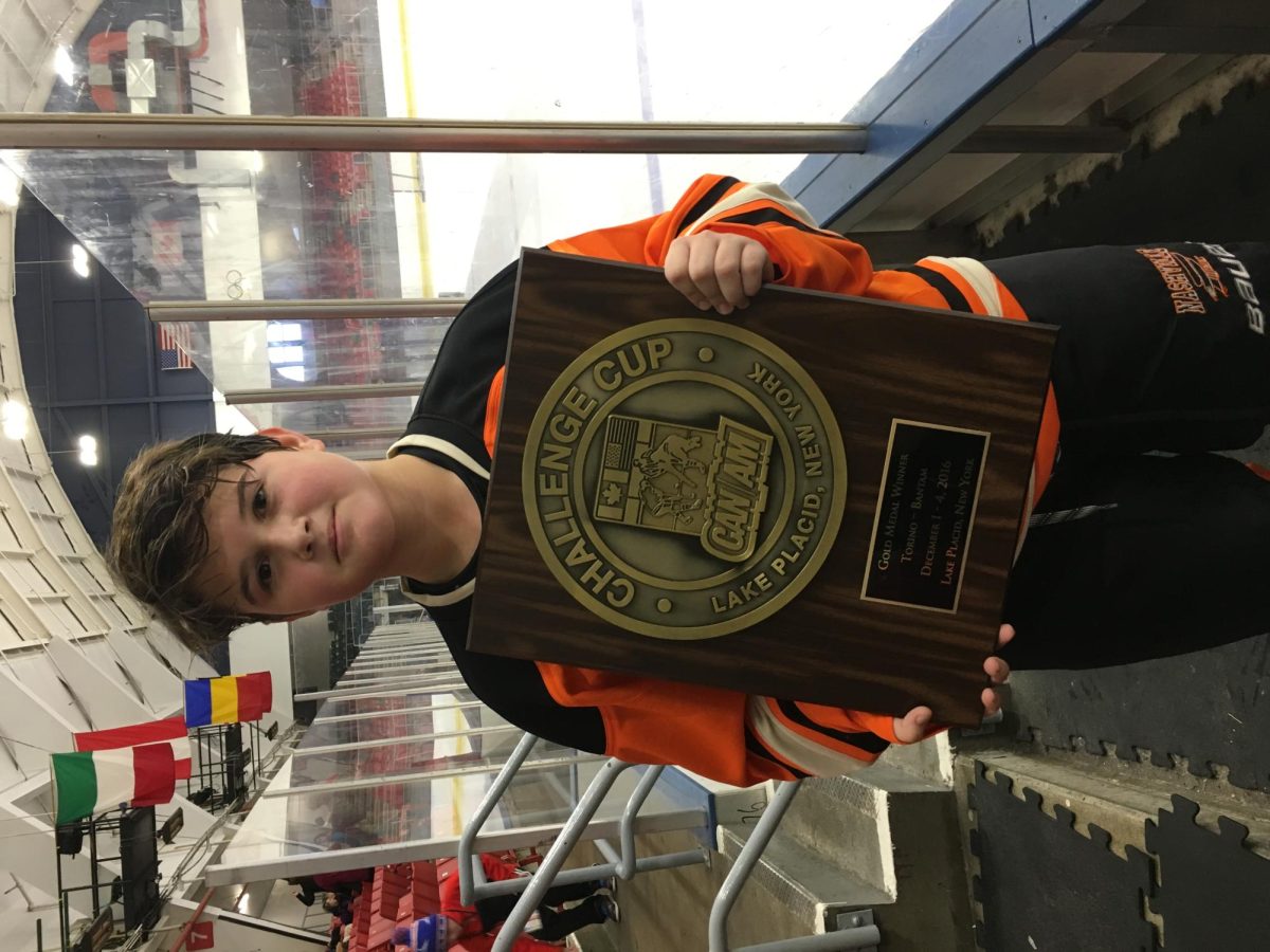 A young Linden Palmer poses with the Challenge Cup trophy. 