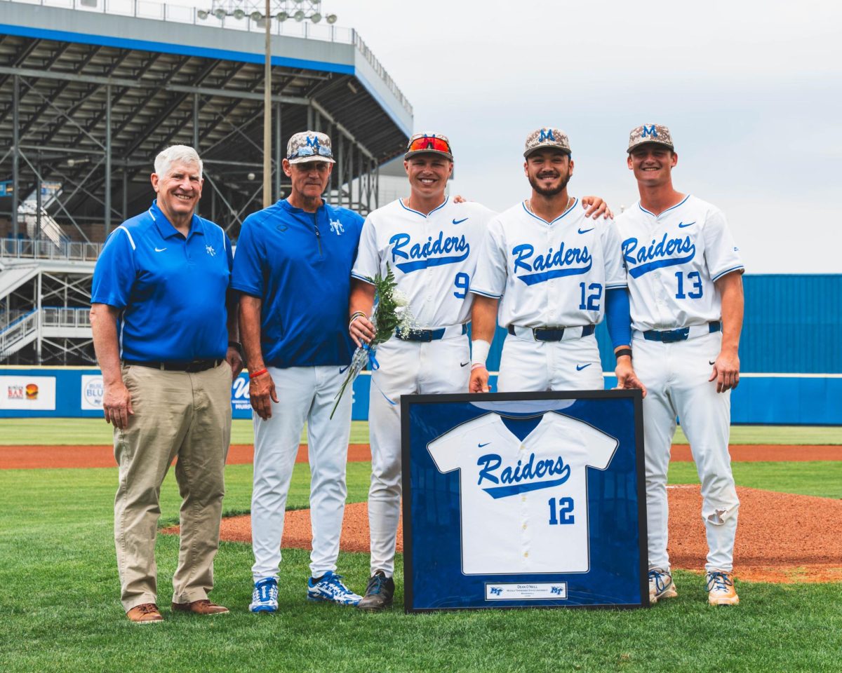MTSU catcher Dean O'Neill poses with (from left to right) Director of Athletics Chris Massaro, MTSU head coach Jerry Meyers, center fielder Owen Nowak and outfielder Brett Rogers during senior day festivities at Reese Smith Jr. Field on May 16, 2026. 