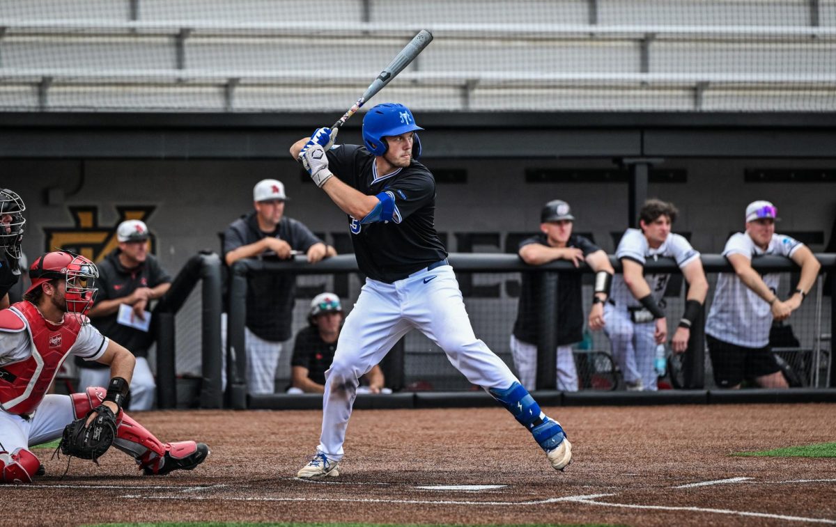 MTSU catcher Tyler Minnick lifts up his lead foot while tracking a pitch during a game against Western Kentucky University at Mickey Dunn Field on May 20, 2026. 