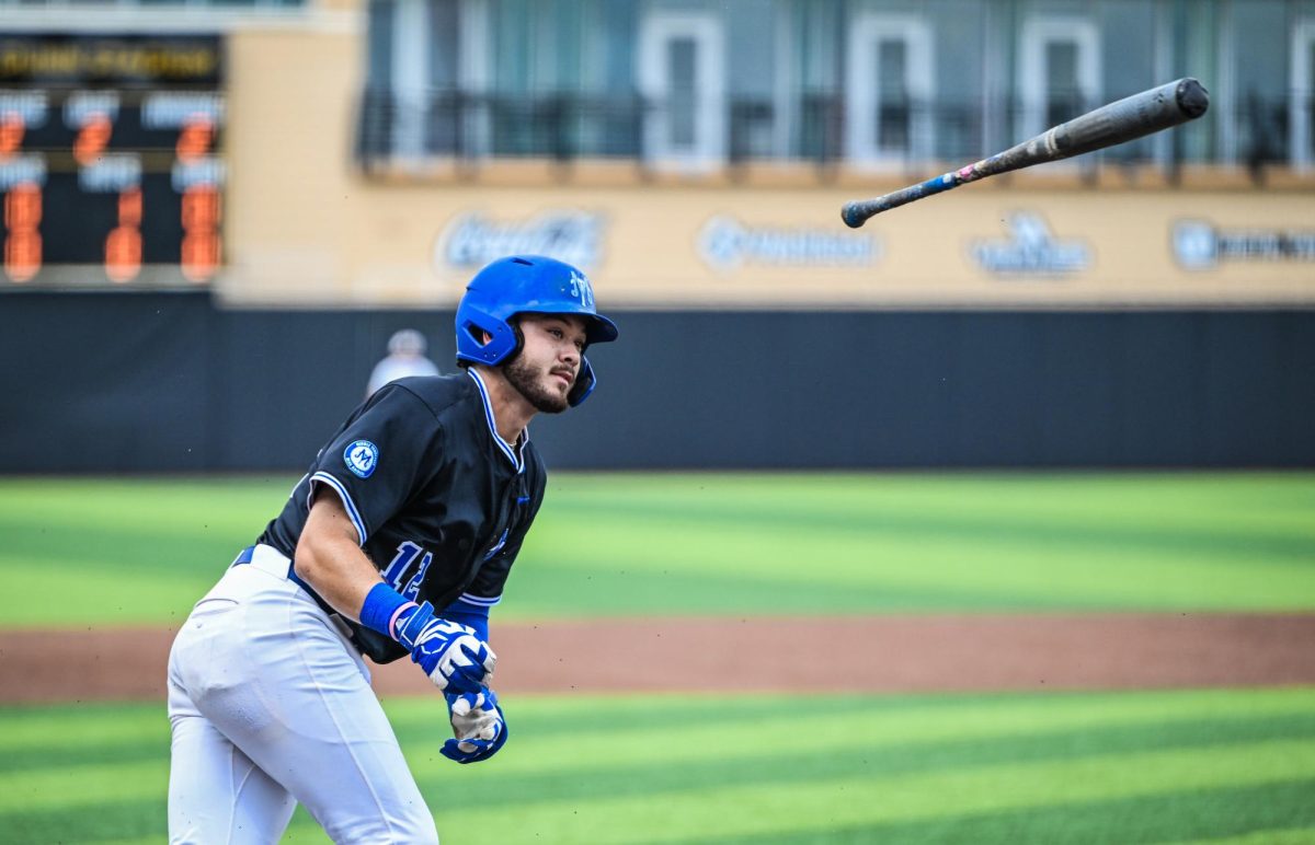 MTSU first baseman Dean O'Neill tosses his bat towards the Middle Tennessee dugout after a walk during a game against Western Kentucky University at Mickey Dunn Field on May 20, 2026. 
