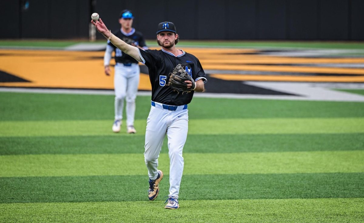 MTSU shortstop Matt Wolfe tosses a ball to MTSU second baseman Cooper Clapp before a game against Western Kentucky University at Mickey Dunn Field on May 20, 2026. 