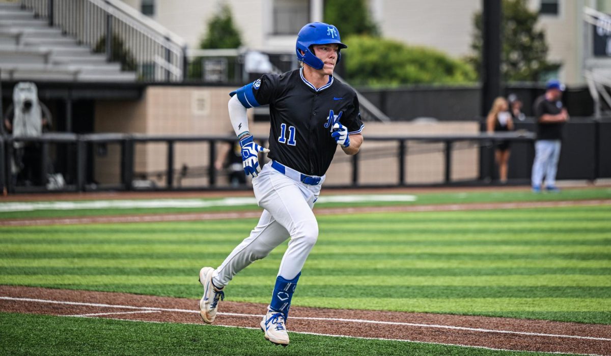 MTSU shortshop Clay Badylak sprints to first base during a game against Western Kentucky University at Mickey Dunn Field on May 20, 2026. 
