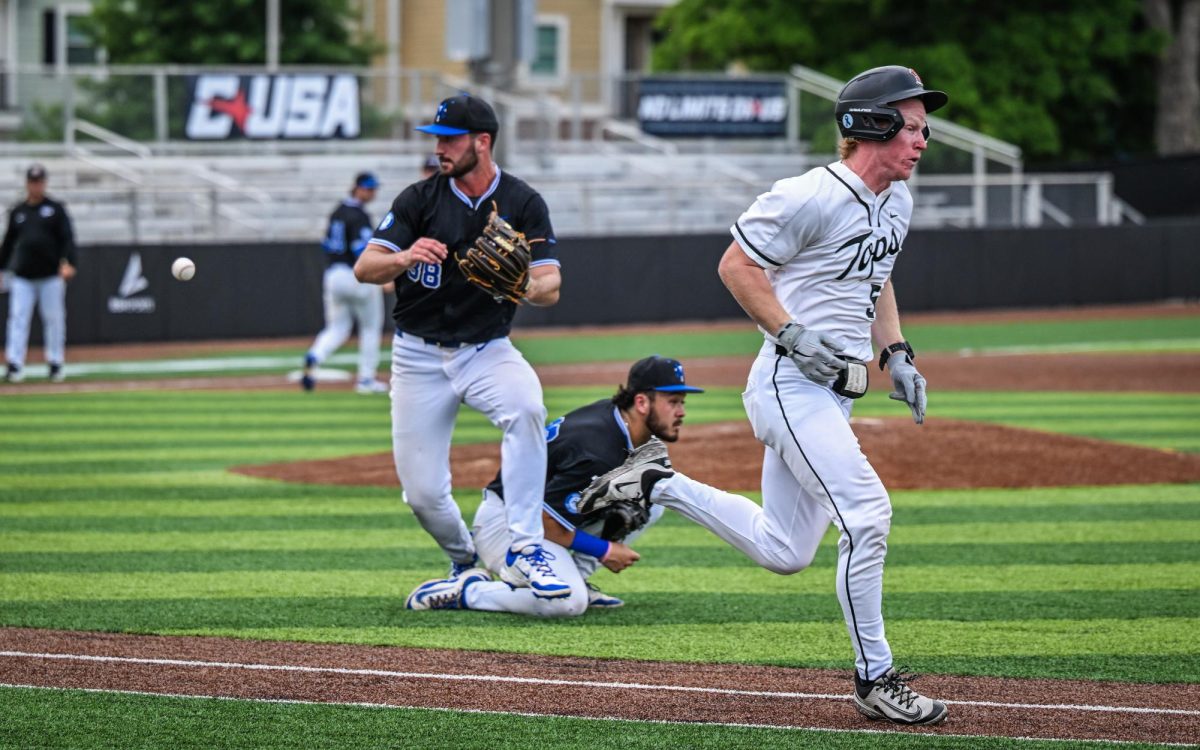 MTSU pitcher David Horn Jr. collides with first baseman Dean O'Neill while WKU outfielder Parker Coley sprints to first base during a game against Western Kentucky University at Mickey Dunn Field on May 20, 2026. 