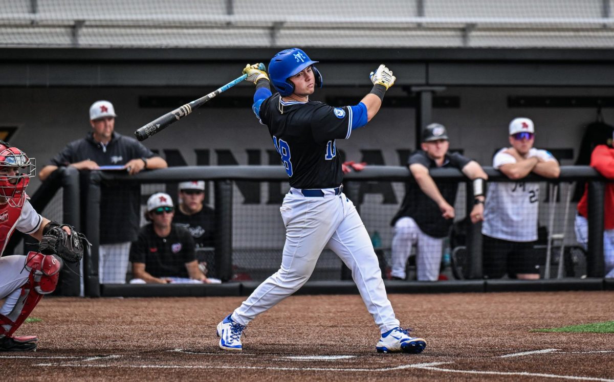 MTSU third baseman Brett Vondohlen follows through on a swing during a game against Western Kentucky University at Mickey Dunn Field on May 20, 2026. 
