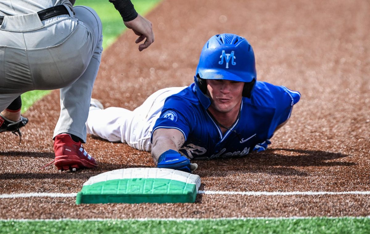 MTSU second baseman Cooper Clapp dives for first base, avoiding a pick off attempt during a game against Jacksonville State University at Mickey Dunn Stadium on May 21, 2026. 