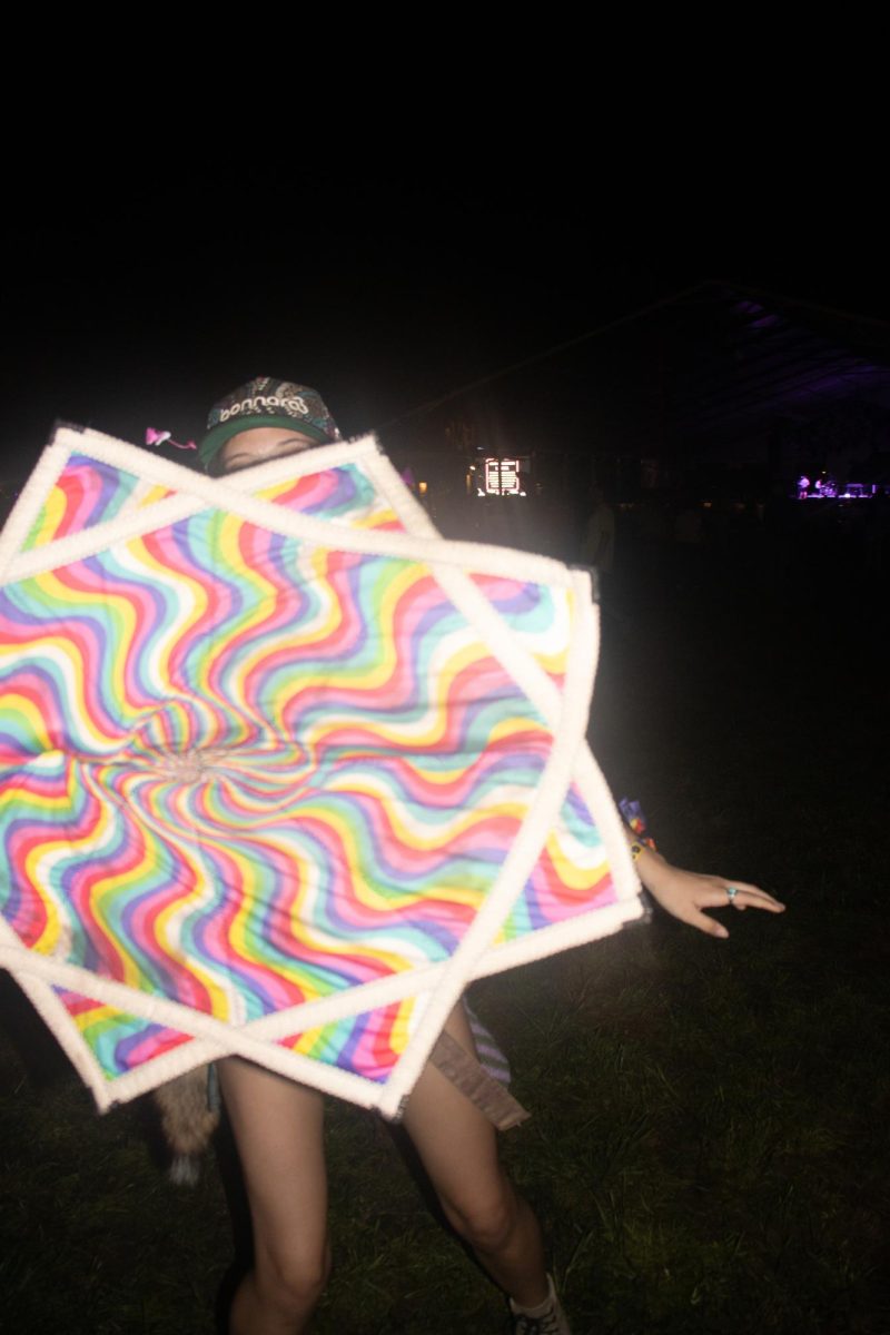 Fan spins a "mougee" — popular art props —in the air at Bonnaroo Music & Arts Festival, 2026. 