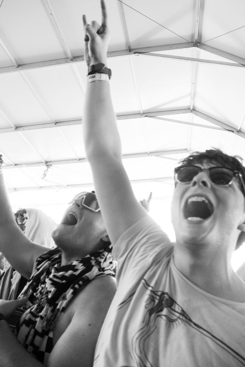 Fans scream as The Stews perform on the That Tent at Bonnaroo Music & Arts Festival 2026. 
