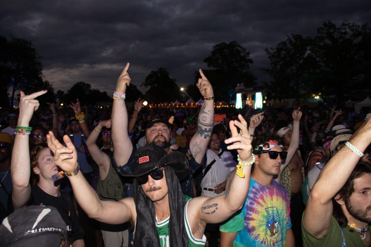 Crowd cheers as Clipse performs on the Which Stage at Bonnaroo Music & Arts Festival, 2026. 