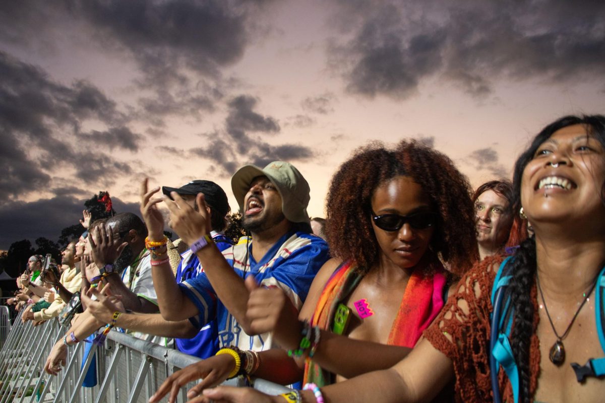 Fans sing along at the barricade as Clipse performs on the Which Stage at Bonnaroo Music & Arts Festival, 2026. 