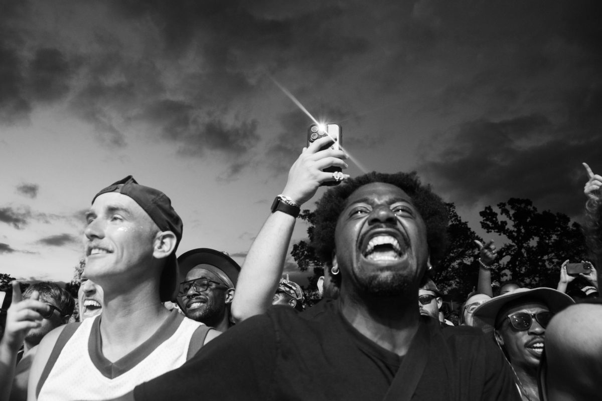 Rowdy fans sing along to Clipse as they perform on the Which Stage at Bonnaroo Music & Arts Festival, 2026. 