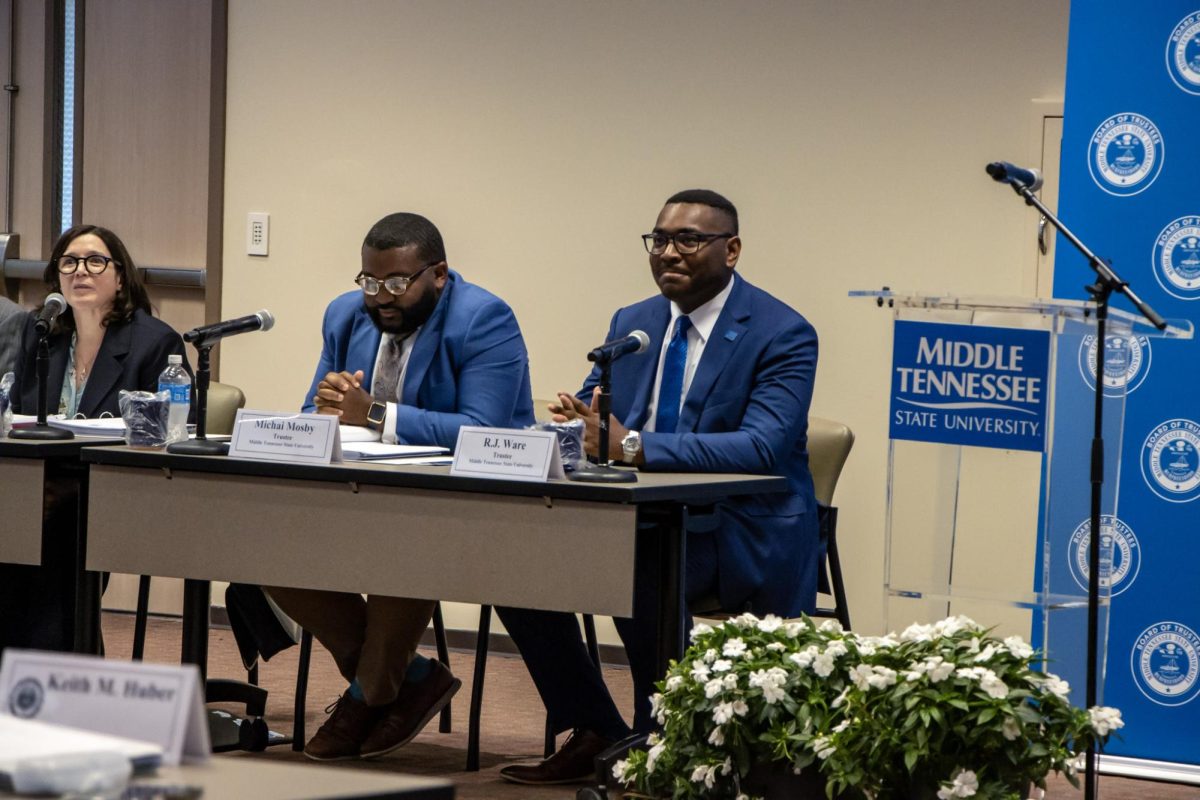 RJ Ware sitting next to Michai Mosby after being confirmed as the student trustee at MTSU on June 16, 2026.